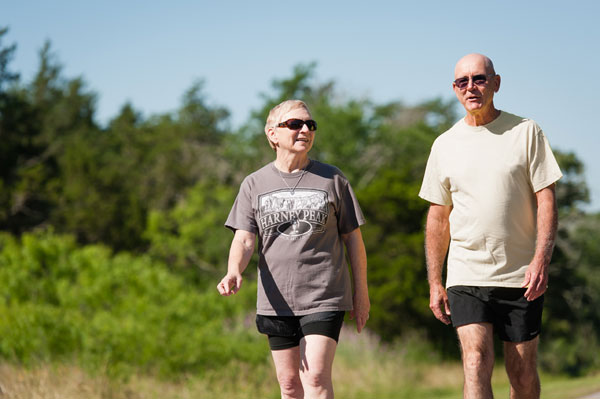 photo of two senior adults walking