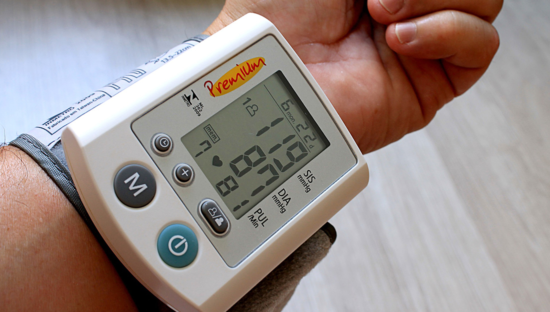 High blood pressure-a blood pressure monitor on a person's wrist