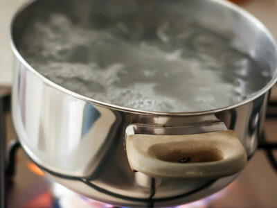 pot of water boils on gas stove