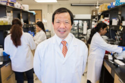 Dr Koichi Kobayashi stands in his research lab