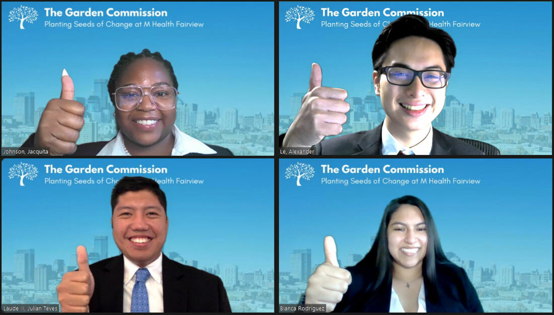 screen shot of a video conference with four students dressed in business attire putting up their thumbs in a "gig 'em" gesture