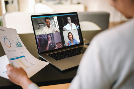 woman joins an online business meeting via video conference